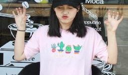 吃瓜绿色衣服女生